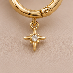 Elegant Golden Star Charm Huggie Earrings